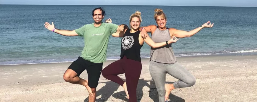 Unwind with a yoga session on the beach